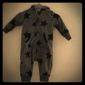 Fleece hooded onesie star pattern.